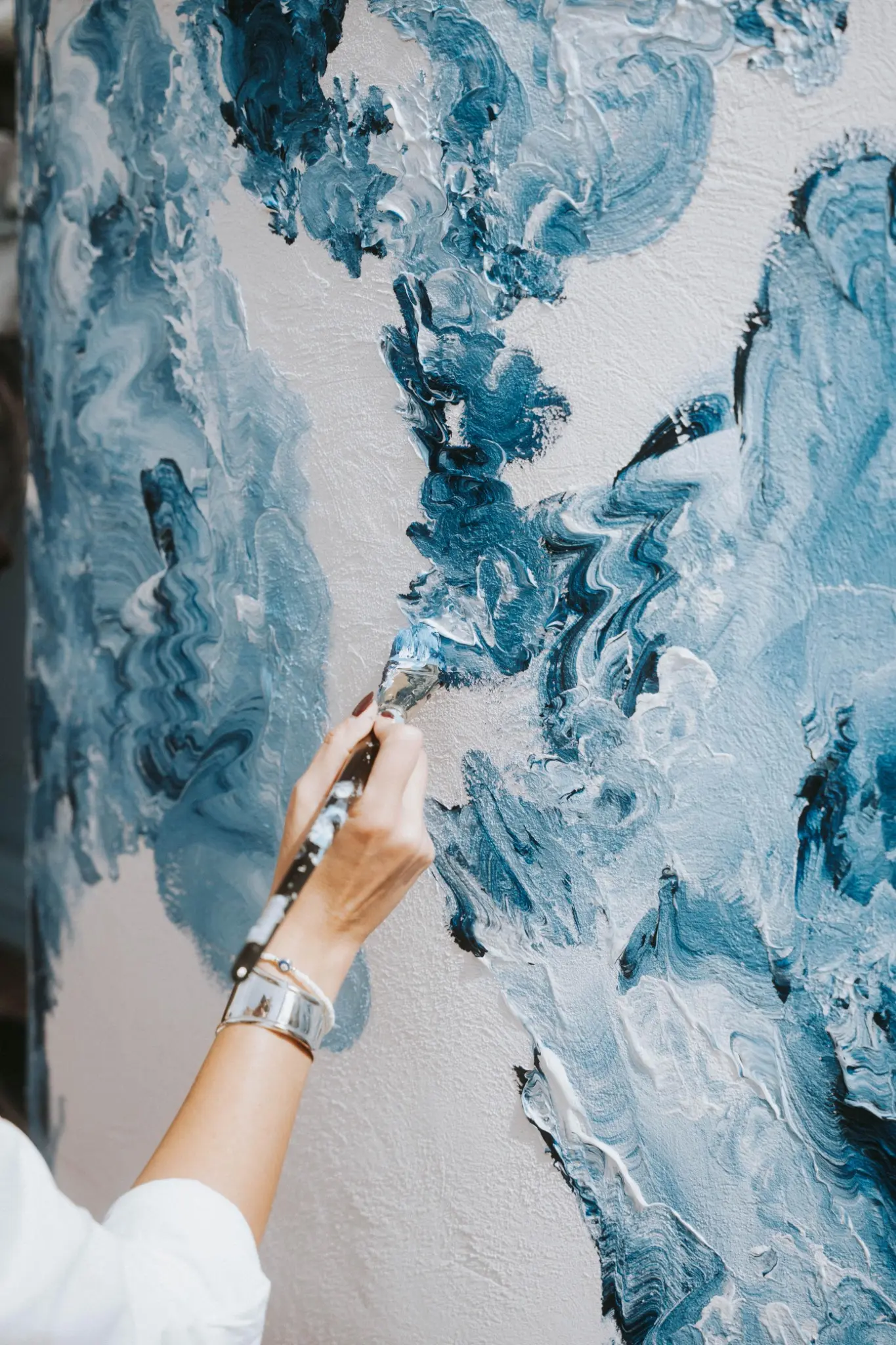 Brushwork and the texture of the paint.