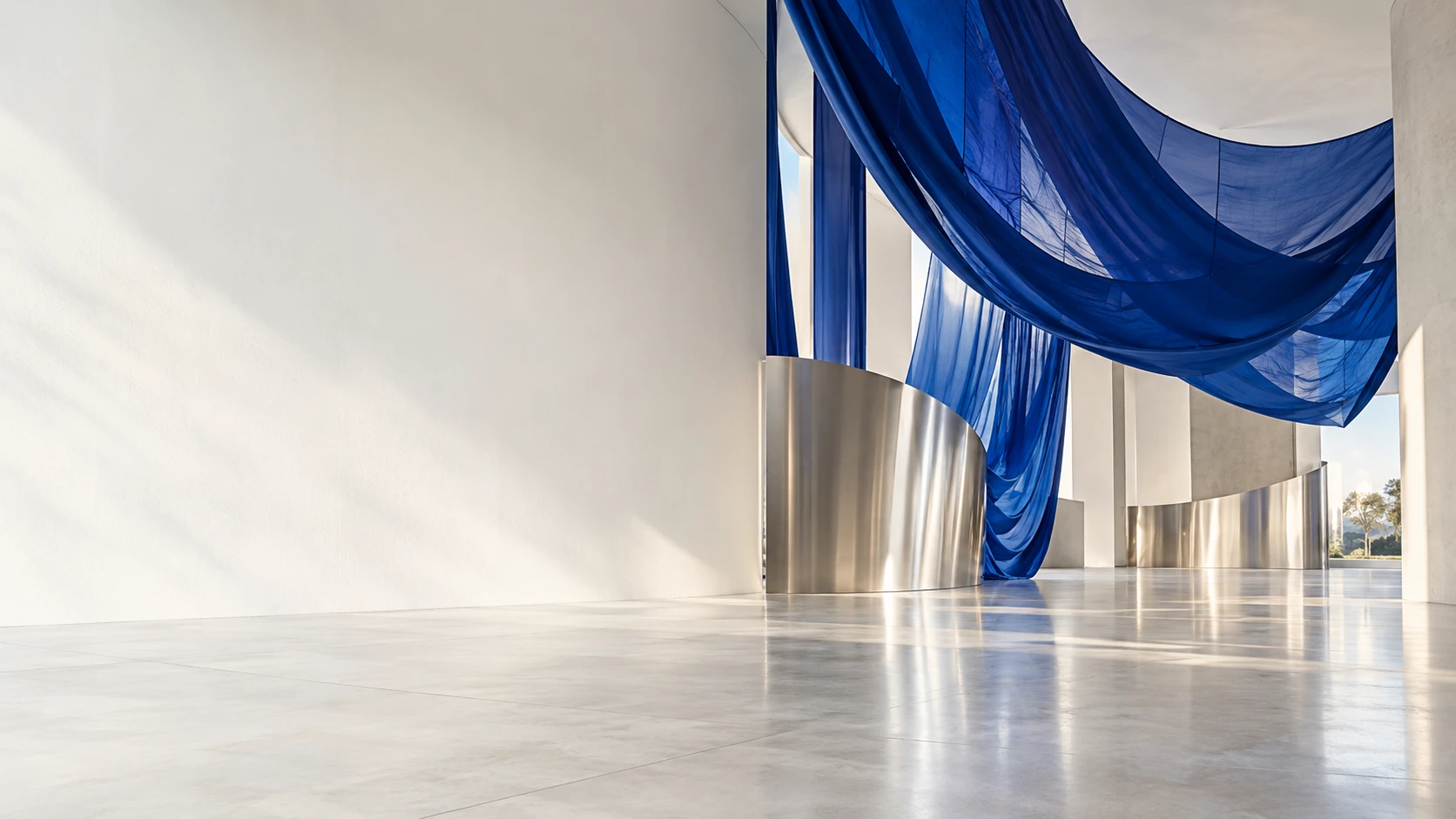 Large blue textile installation in a bright lobby