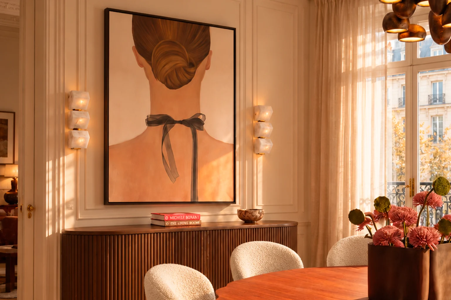 Figurative painting of a woman’s neck tied with a ribbon, hung in the dining room of a Haussmann apartment